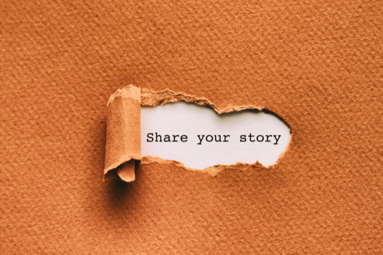 typewritten words share your story on a sheet of paper