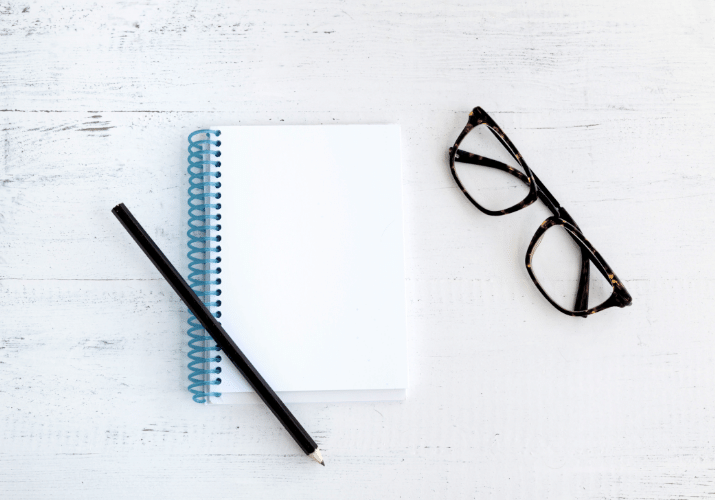 Notebook with glasses